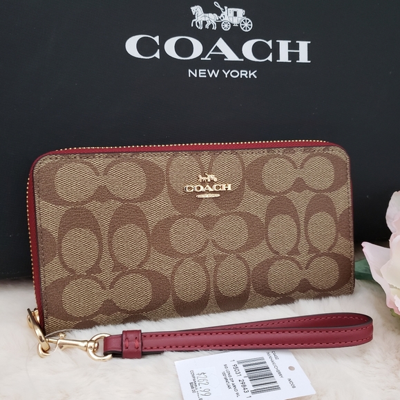 Coach Handbags - 🏠New Coach LONG ZIP AROUND WALLET IN SIGNATURE CANVAS